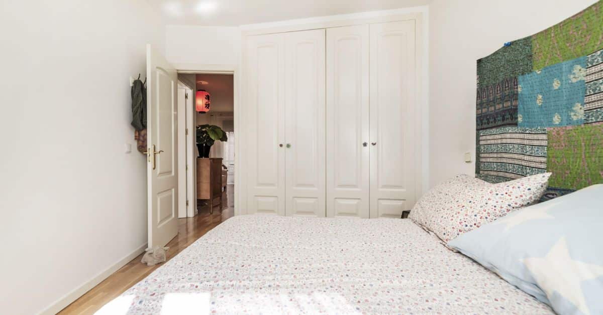 Custom Bedroom Built-In Closet Bedroom with built-in closet doors providing custom storage space.