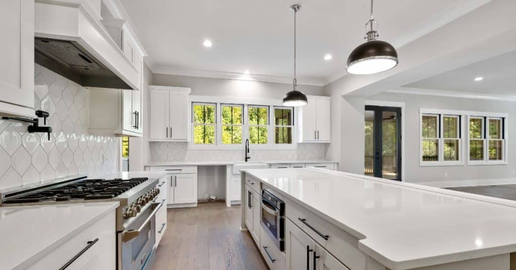 Modern white kitchen remodeling Port St. Lucie with large island