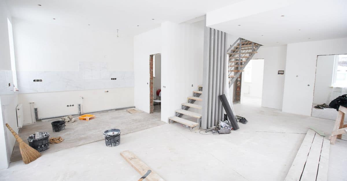 Split Level Home Remodel Open Concept Renovation Open-concept split level home remodel with staircase and construction work in progress.