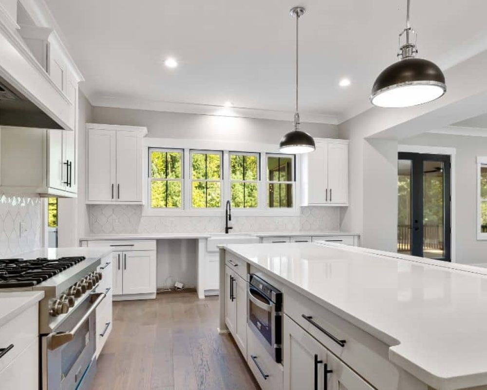 Modern white kitchen remodeling Port St. Lucie with large island